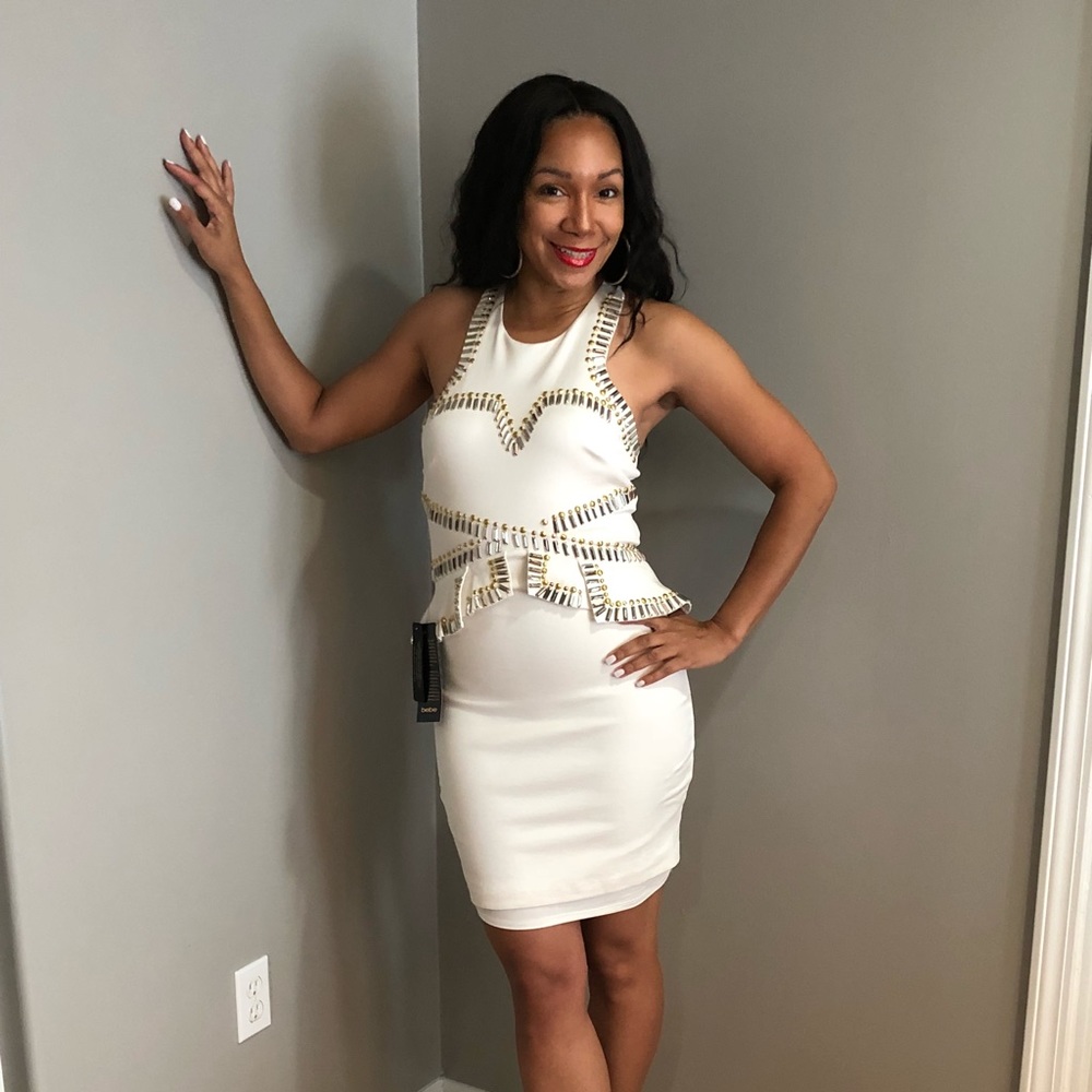 Off white Bebe dress with embellishments.